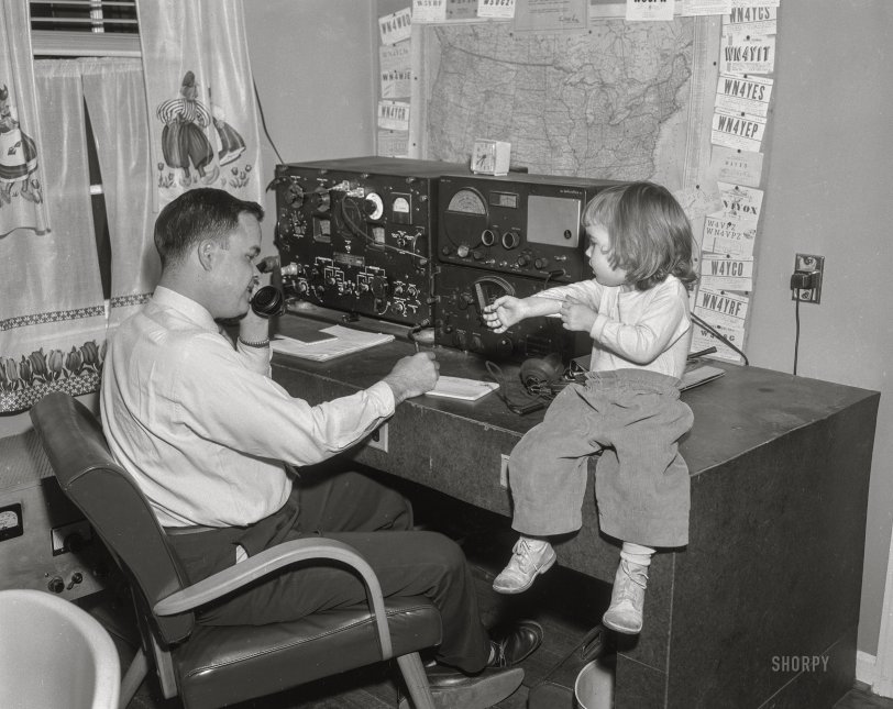 From Columbus, Georgia, around 1960 comes this News Archive photo of an amateur radio operator and his assistant, "Shortwave" Sally. 4x5 inch acetate negative. View full size.
