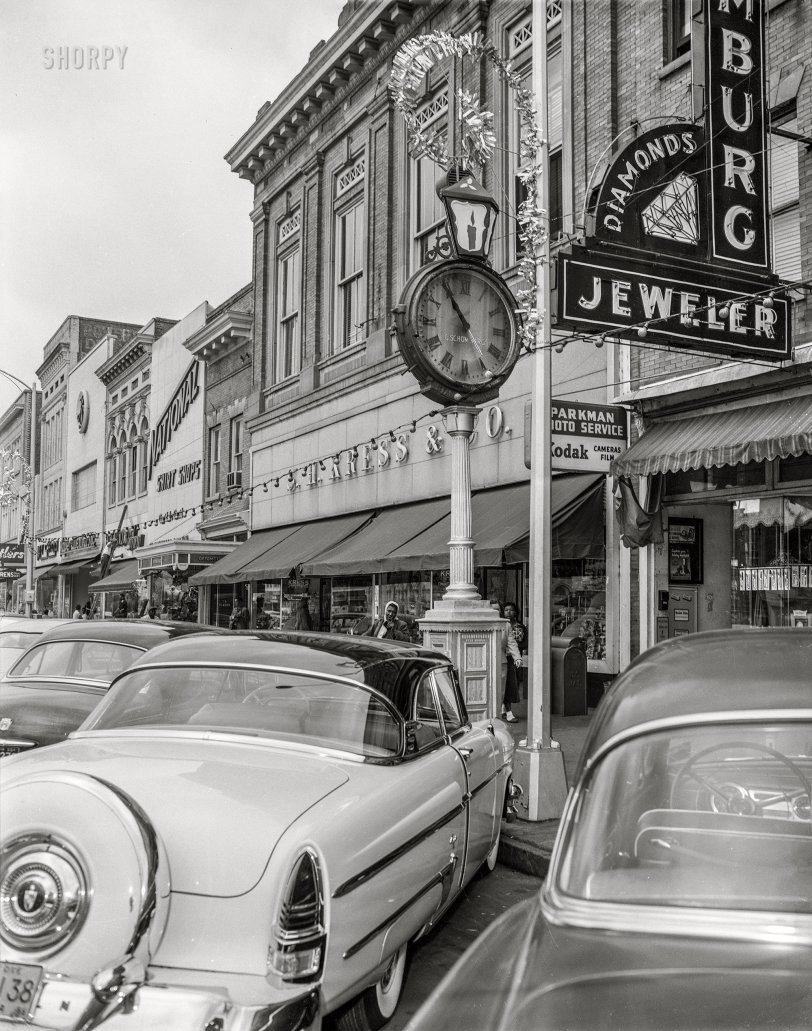 December 1955. Columbus, Georgia. "Christmas decorations on Broadway." 4x5 inch acetate negative from the Shorpy News Photo Archive. View full size.

