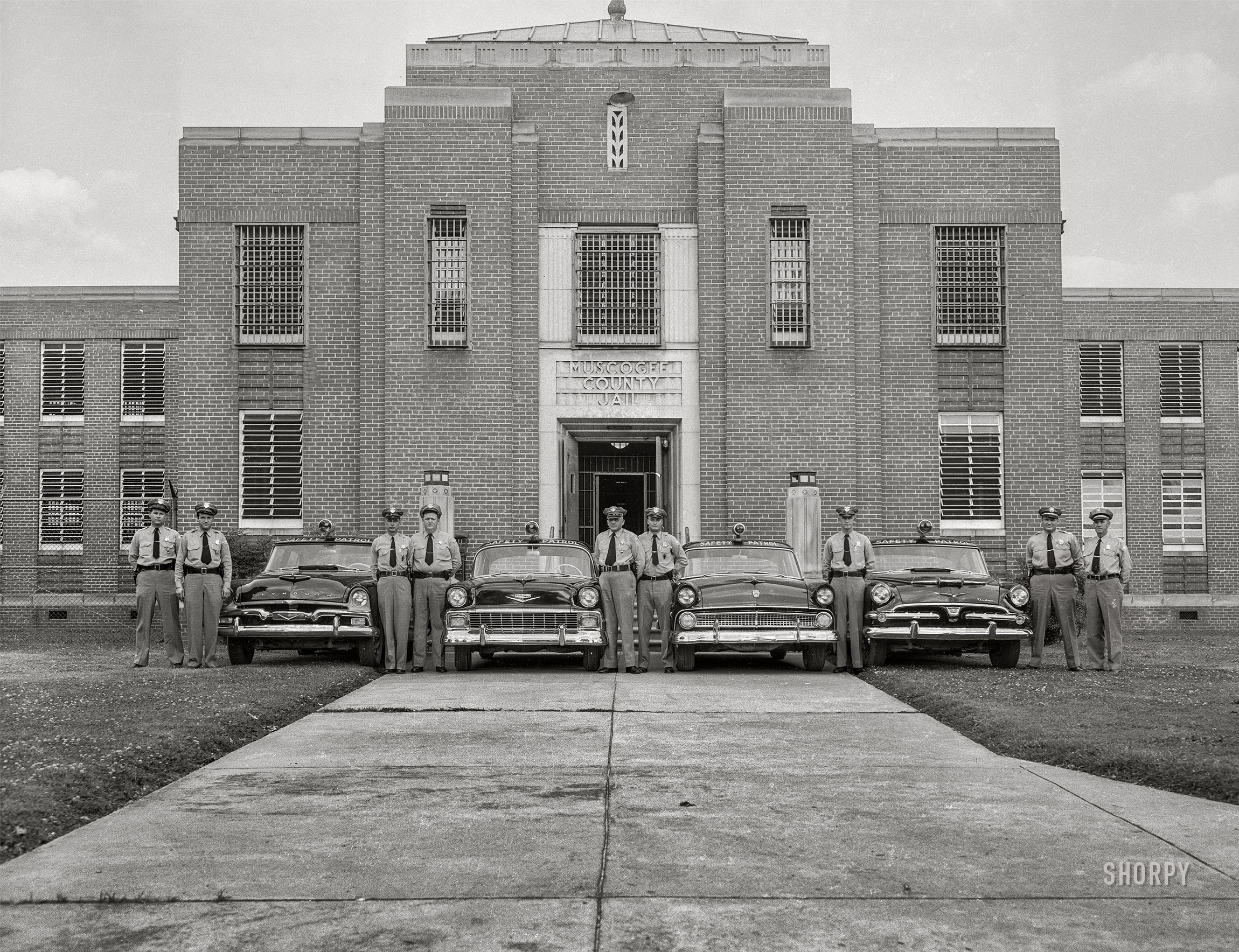 Columbus, Georgia, circa 1956. "Police cars at Muscogee County Jail." Let's be careful out there! 4x5 inch acetate negative from the Shorpy News Photo Archive. View full size.