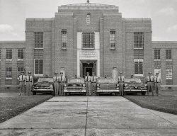 Columbus, Georgia, circa 1956. "Police cars at Muscogee County Jail." Let's be careful out there! 4x5 inch acetate negative from the Shorpy News Photo Archive. View full size.
