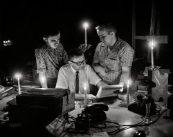 This circa 1958 candlelight candid offers a glimpse of the Columbus Ledger-Enquirer city desk during a power outage. Start the presses! 4x5 inch acetate negative. View full size.