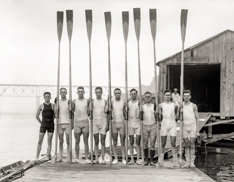 Summer 1914. "Penn 2nd varsity crew team in Poughkeepsie." Rowers at the boathouse. Bain News Service glass negative. View full size.
