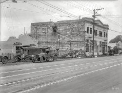 San Mateo County, California, 1924. "Daly City Deputy Health Officer and construction trucks." Also the quarters of the Constable, not to mention "Oiling & Greasing." 6½ x 8½ inch glass negative by Christopher Helin. View full size.