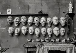 August 1918. "Mutiles. Paris, France. Masks showing different stages in the work done by Mrs. Anna Coleman Ladd of the American Red Cross for soldiers whose faces have been mutilated in the war. The upper row shows casts taken from the faces as they actually are, the lower row shows the faces which Mrs. Ladd has modelled on the foundation of the life mask with the help of photographs taken before the wound was received & on the table may be seen some of the final masks made for fit over the disfigured part of the face & colored as exactly as possible like life." 5x7 glass negative by Henri A. Coles for the ANRC. View full size.