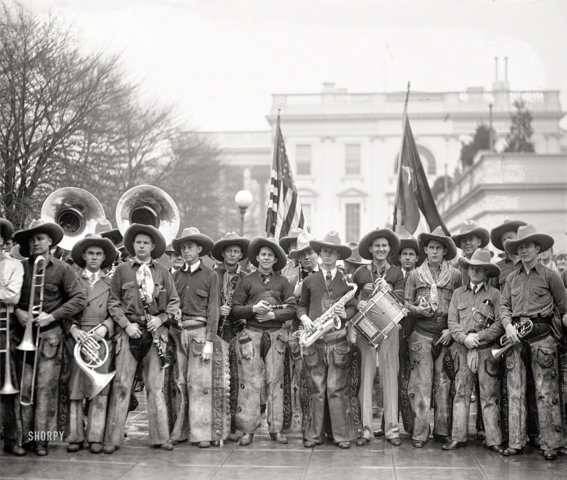 &nbsp; &nbsp; &nbsp; &nbsp; At noon the Texas Cowboy Band from Simmons College in Abilene played for Mrs. Hoover, later also playing for the President.
March 5, 1929. "Cowboy Band serenades President and Mrs. Hoover at White House following Inauguration." National Photo glass negative. View full size.
