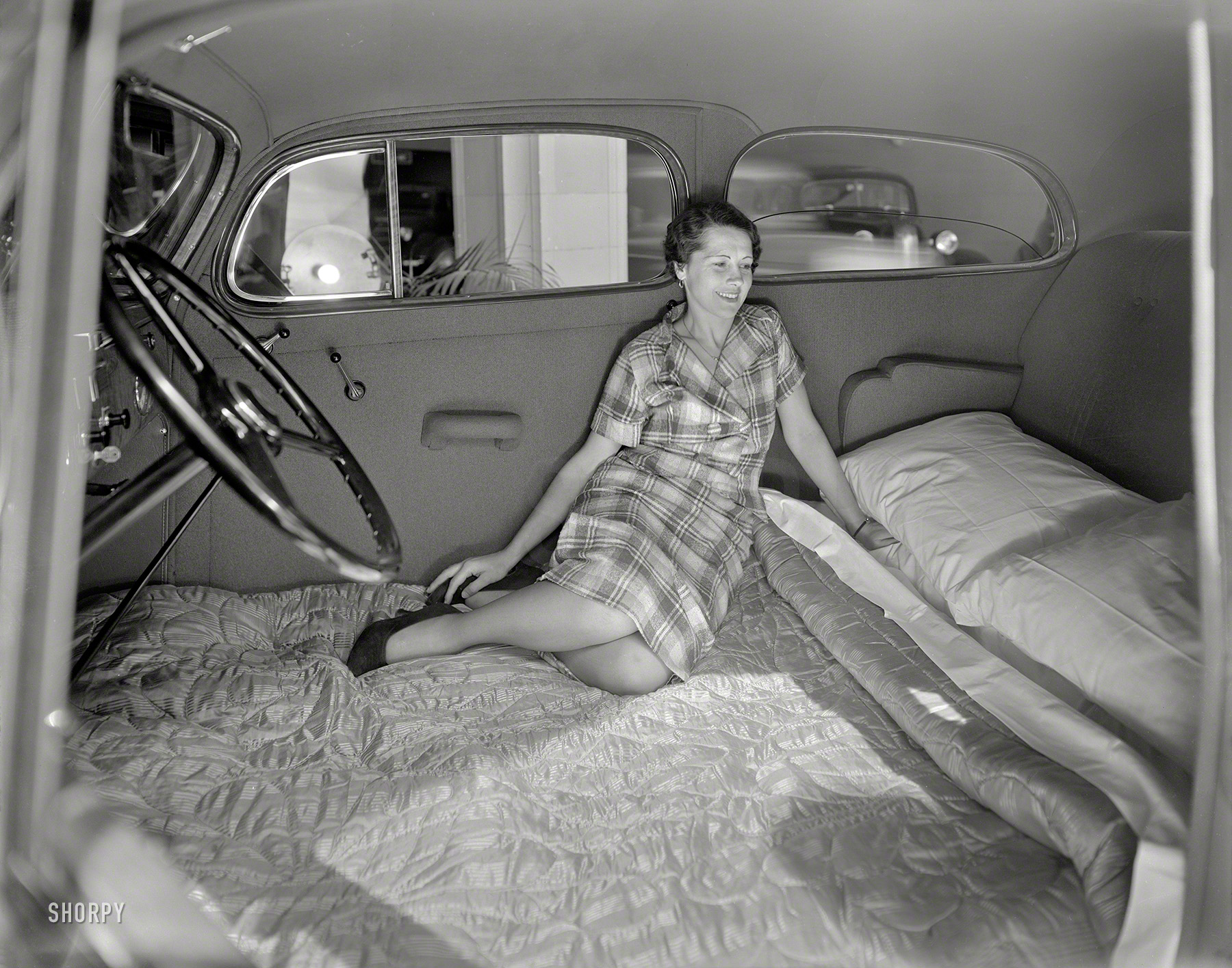 June 3, 1936. San Francisco. "Woman in Pontiac made into bed." Some cars are just better at stopping than going. 8x10 nitrate negative. View full size.