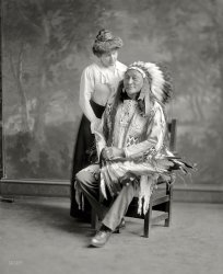 &nbsp; &nbsp; &nbsp; &nbsp; In 1913, the Sioux chief Hollow Horn Bear led a delegation of Indians to the inauguration of President Woodrow Wilson. He caught pneumonia during the visit and died.
Washington, D.C., ca. 1913. "Hollow Horn Bear." Whose visage graced five-dollar bills and 14-cent postage stamps, and whose companion's figure has been whittled down by Harris & Ewing's retouchers. 8x10 glass negative. View full size.