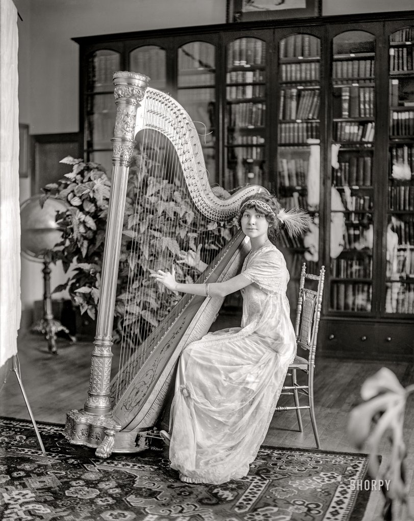 Washington, D.C., circa 1911. "Mawhinney, M., Miss." Mary Mawhinney at the harp. Harris &amp; Ewing Collection glass negative. View full size.
