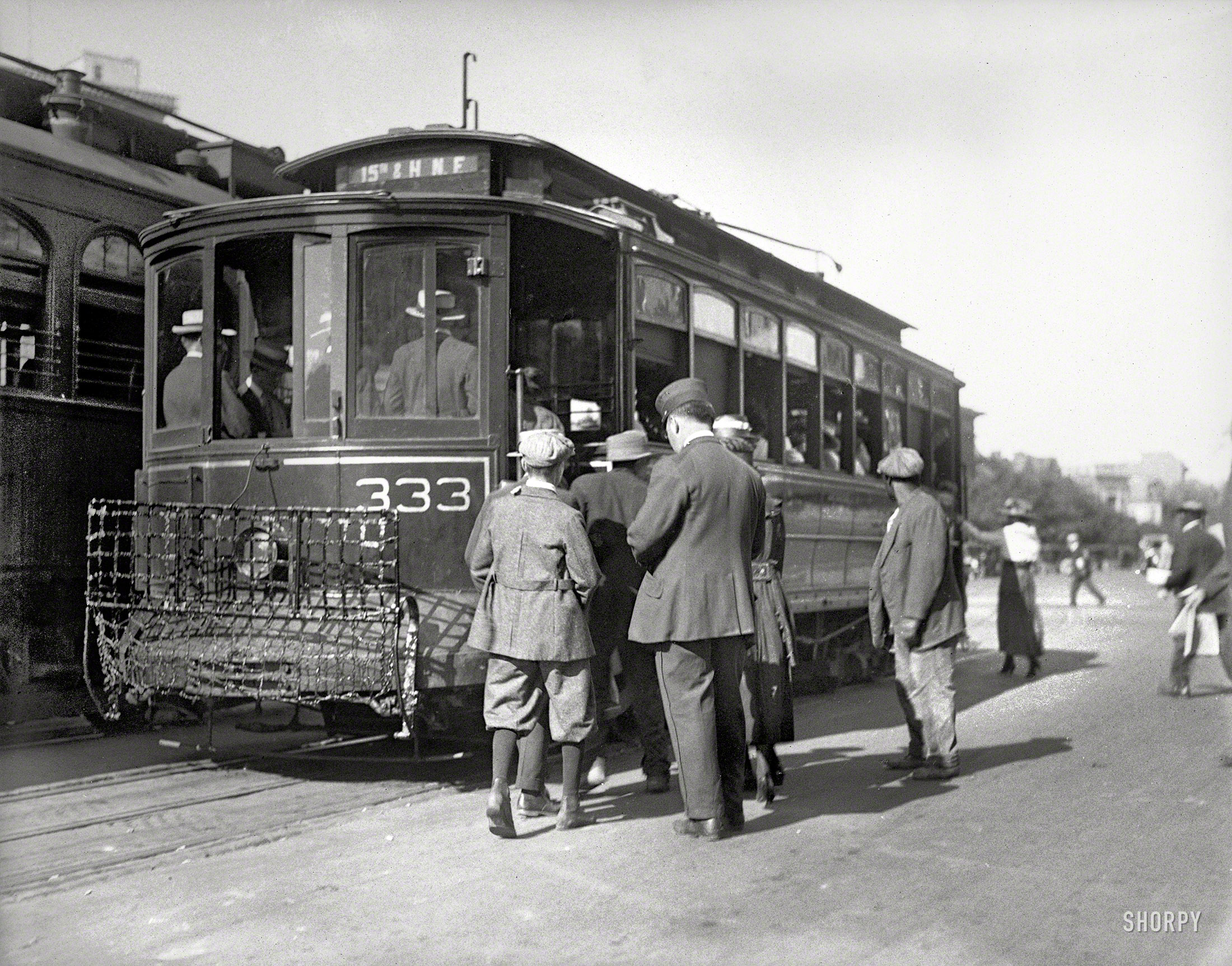Circa 1919. "Streetcar in Washington, D.C." With what seems to be a pedestrian-scooper in the "up" position. National Photo glass negative. View full size.
