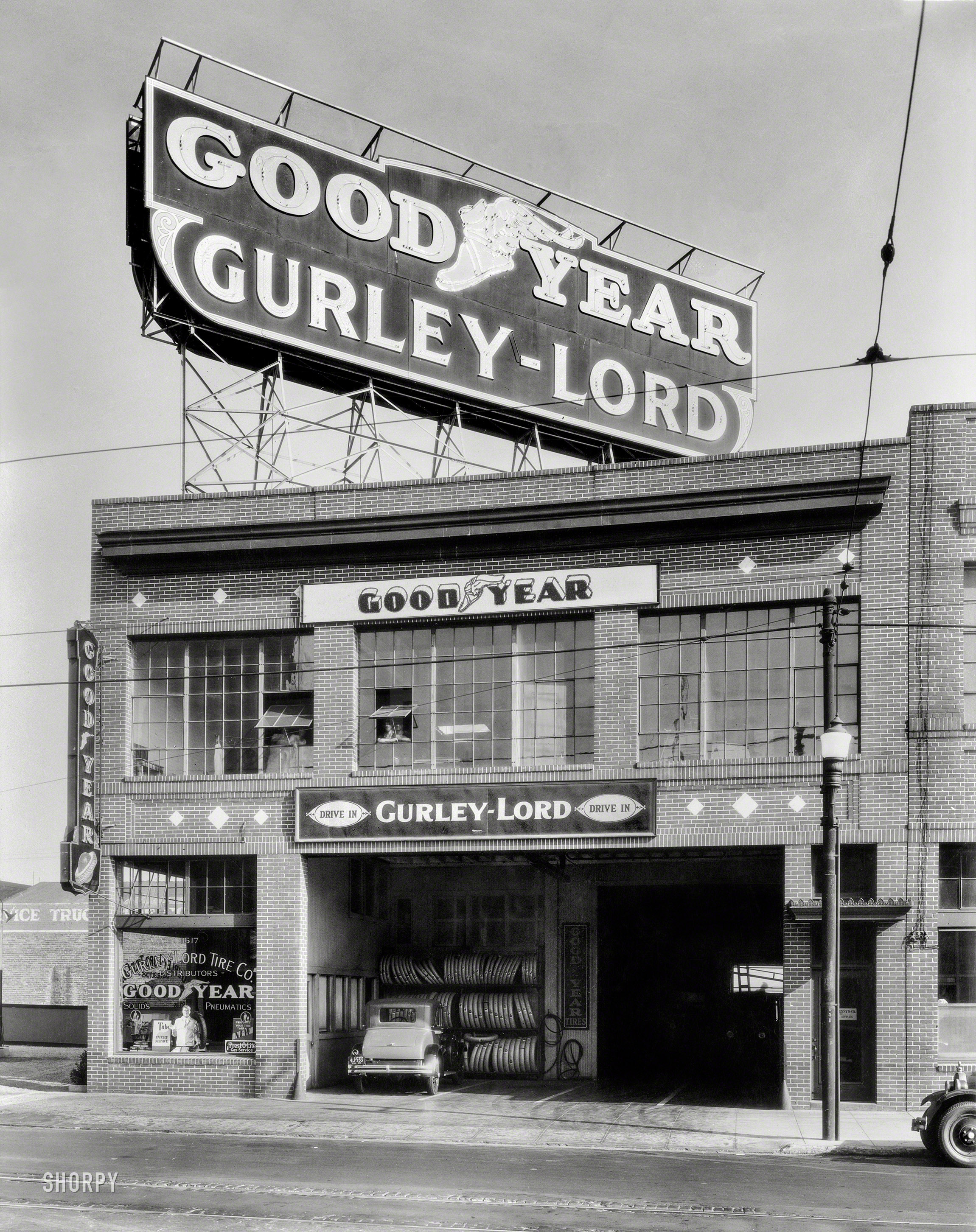 "Gurley-Lord service station, San Francisco, 1929." One of eight 8x10 negatives showing rubber-related activities at Goodyear tire dealers. View full size.
