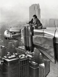 New York circa 1934. "Margaret Bourke-White with her camera atop a stainless steel eagle projecting from the sixty-first floor of the Chrysler Building, overlooking Manhattan and the Hudson River." Gelatin silver print from a photograph by Bourke-White's darkroom assistant Oscar Graubner. Her backdrop is Rockefeller Center's RCA Building, completed in 1933. View full size.