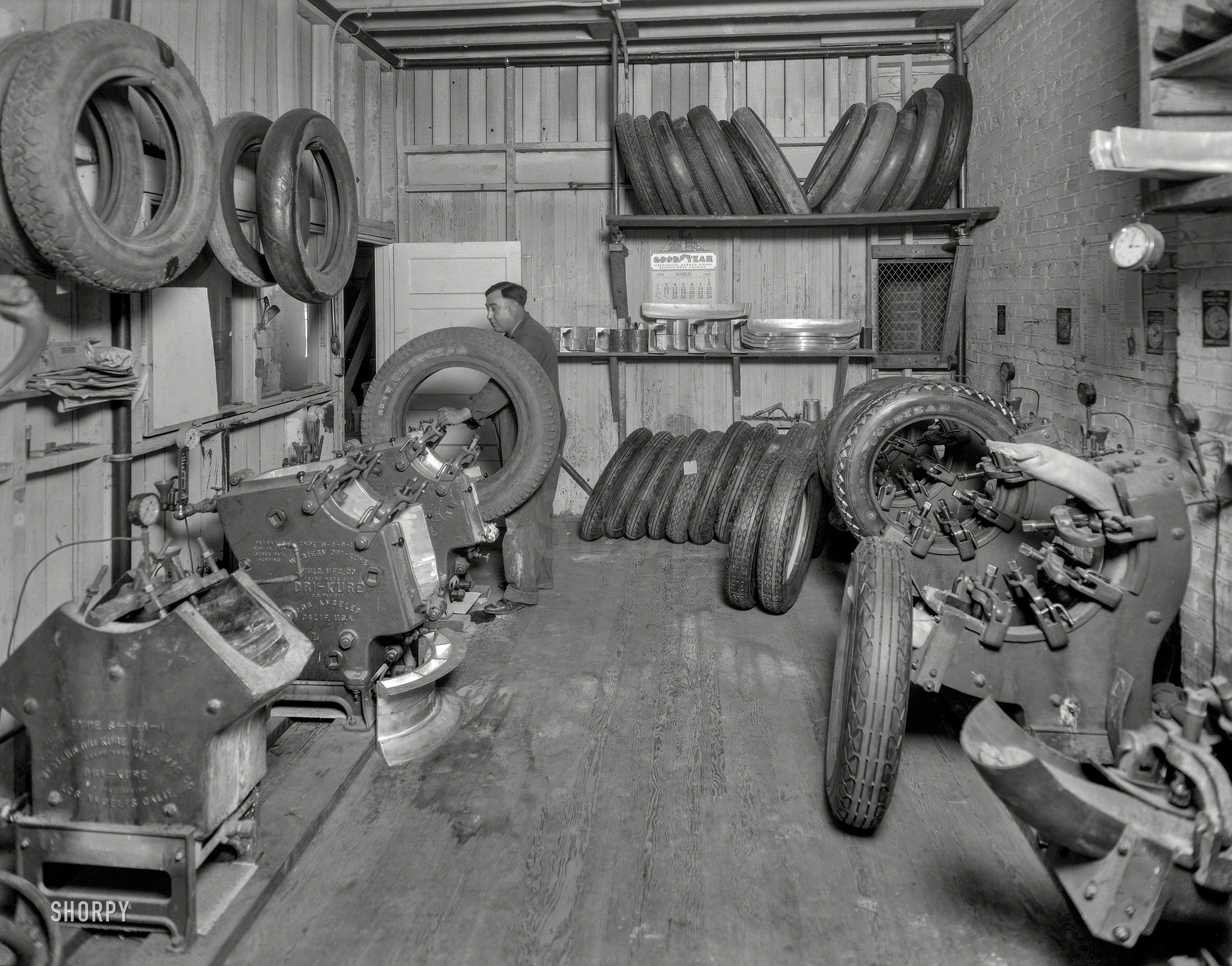 San Francisco in 1930. "Goodyear tire retreading." Equipment by Western Dri-Kure. Third photo in this series. 8x10 nitrate negative. View full size.