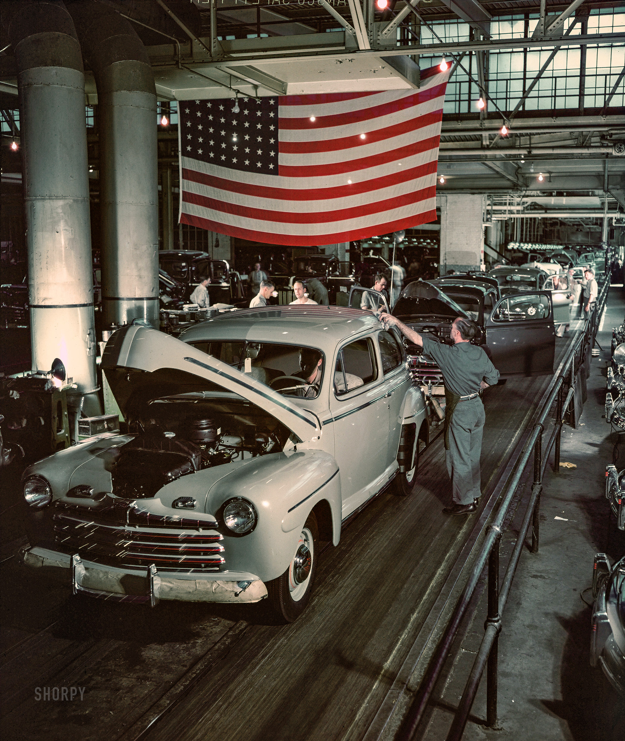 Dearborn, Michigan, 1946. "Ford Rouge B-Building. Cars leaving assembly line." Ansco color transparency from the Ford Motor Co. photographic archives. View full size.