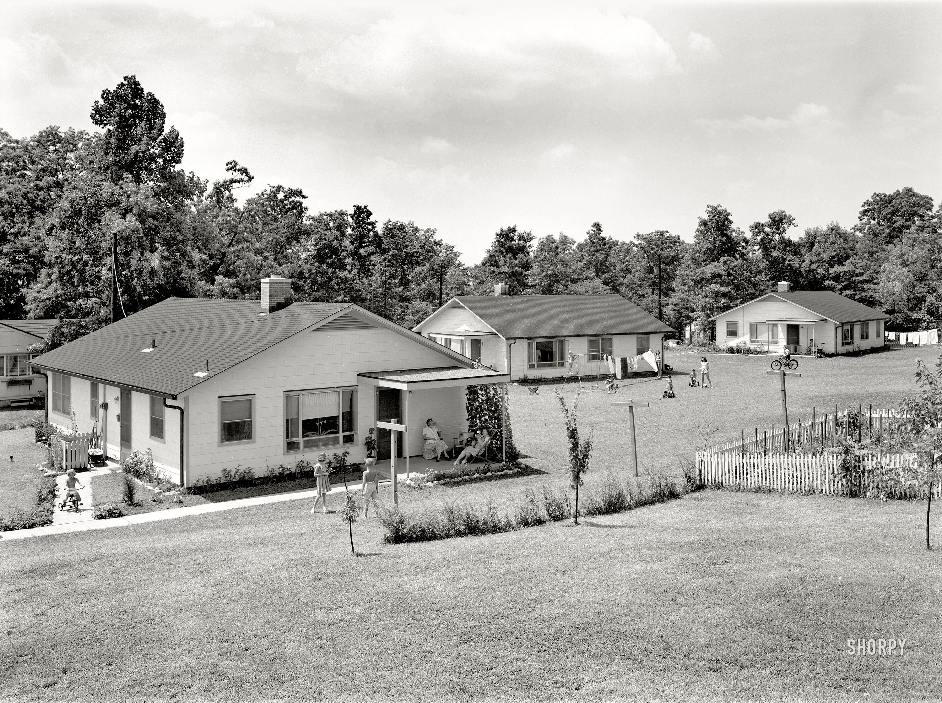 August 3, 1951. Oak Ridge, Tennessee. "Three Type 34 Houses -- 601 Michigan, 102 & 102½ Meadow Road." Photo by Jack Tarver for the Atomic Energy Commission. View full size.