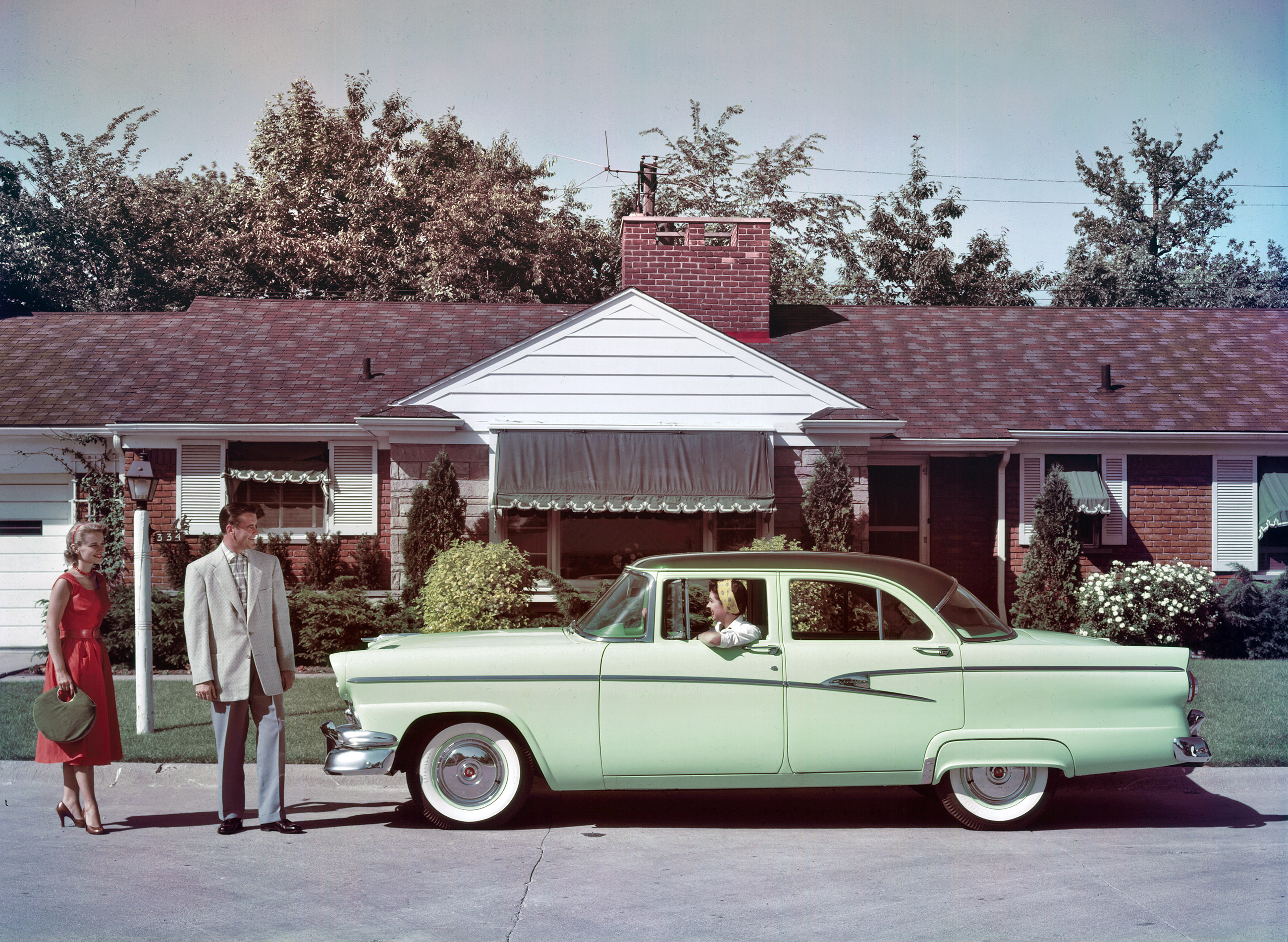 Dearborn, Michigan. "1956 Ford Customline Fordor Sedan in Meadowmist Green." A stylish suburbanite and her toothpaste-toned transport. Color transparency from the Ford Motor Co. photographic archives. View full size.