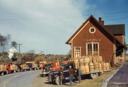 October 1940. "Trucks outside of a starch factory, Caribou, Aroostook County, Maine. There were almost 50 trucks in the line. Some had been waiting for 24 hours for the potatoes to be graded and weighed." 35mm Kodachrome by Jack Delano for the Farm Security Administration. View full size.