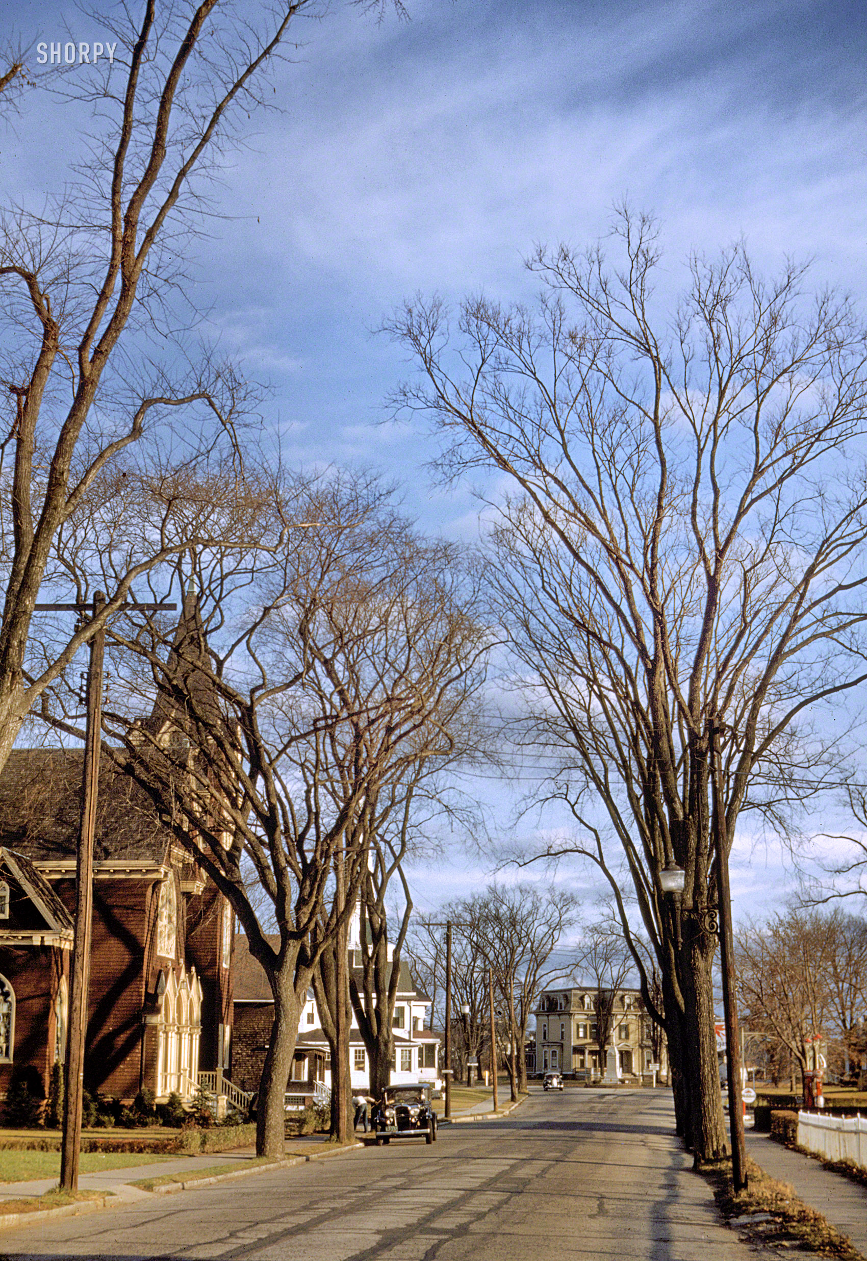 November 1940. "Street scene in Mystic, Connecticut." A view down East Main Street of the Christopher Morgan house, last seen here. 35mm Kodachrome by Jack Delano for the Farm Security Administration. View full size.