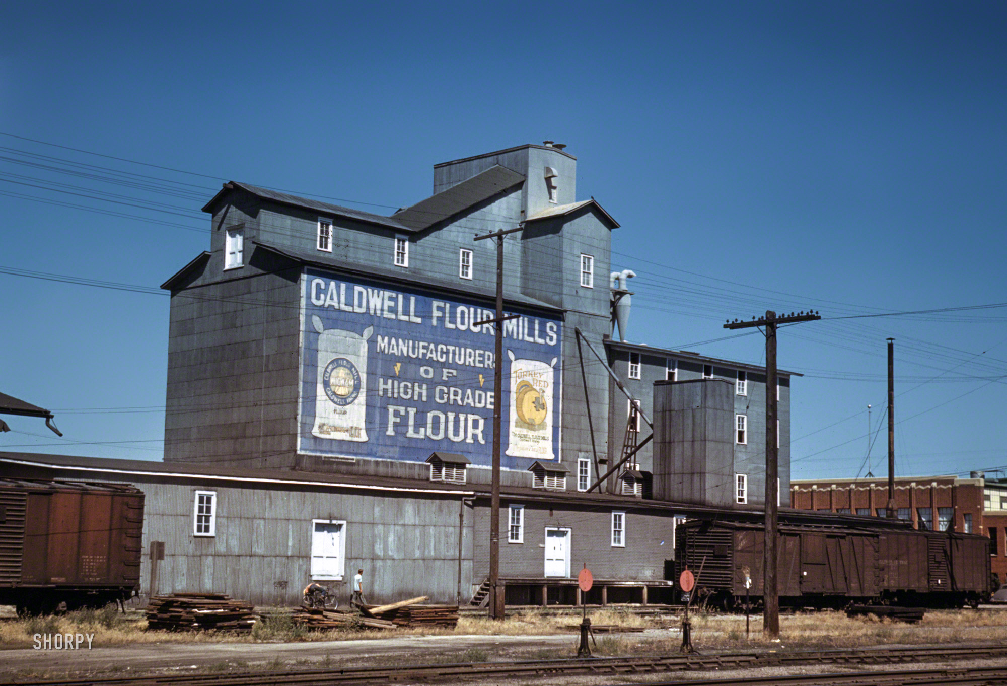 July 1941. "Flour mill in Caldwell, Idaho." 35mm Kodachrome transparency by Russell Lee for the Farm Security Administration. View full size.