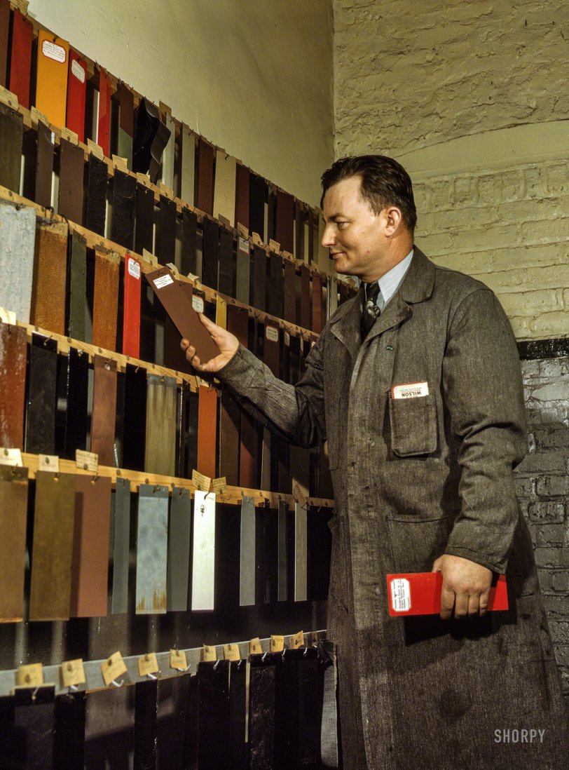 December 1942. "Research laboratory worker at the Chicago &amp; North Western's 40th Street yard, examining paint samples used on freight cars and coaches of the railroad." Paint your wagon, or color-coordinate your caboose. Kodachrome transparency by Jack Delano for the Office of War Information. View full size.
