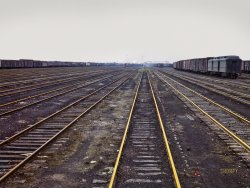 April 1943. "Tracks at Chicago & North Western railroad's Proviso yard, Chicago." Kodachrome transparency by Jack Delano for the Office of War Information. View full size.