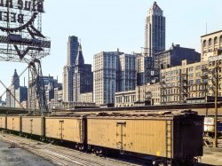 April 1943. The PBR R.R.: "Pabst Beer sign over the Illinois Central freight yard at South Water Street, Chicago." Kodachrome by Jack Delano. View full size.