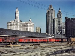 April 1943. "Trucks unloading at the inbound freight house of the Illinois Central Railroad, South Water Street freight terminal, Chicago." 4x5 Kodachrome transparency by Jack Delano. View full size.
