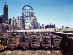 May 1, 1943. "South Water Street freight depot of the Illinois Central Railroad, Chicago." 4x5 Kodachrome transparency by Jack Delano. View full size.