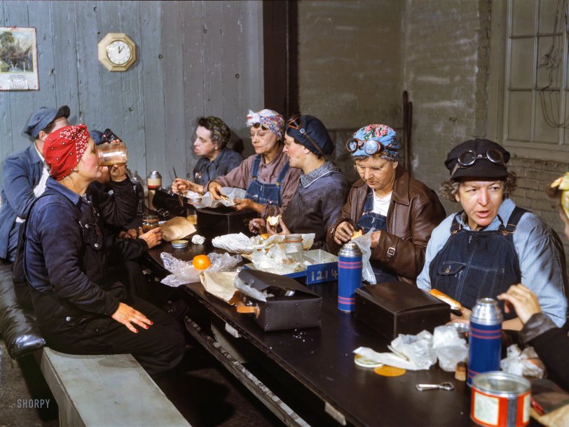 April 1943. "Women workers employed as wipers in the roundhouse having lunch in their rest room, Chicago &amp; North Western Railroad, Clinton, Iowa." Marcella Hart is at left, Mrs. Elibia Siematter at right. Kodachrome transparency by Jack Delano for the Office of War Information. View full size.
