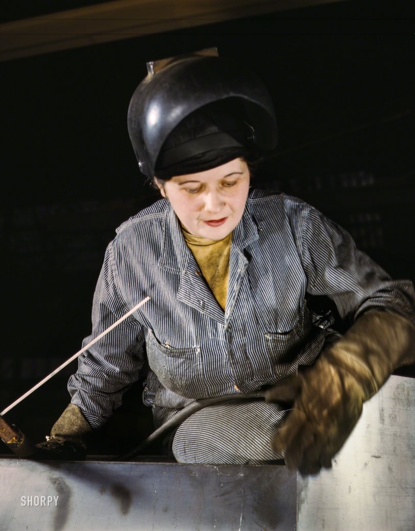 February 1943. "Enola O'Connell, age 32, widow and mother of one child, ex-housewife, now the only woman welder at Heil and Co., Milwaukee, maker of gasoline trailers for the Army Air Forces." Medium format Kodachrome by Howard Hollem for the Office of War Information. View full size.
