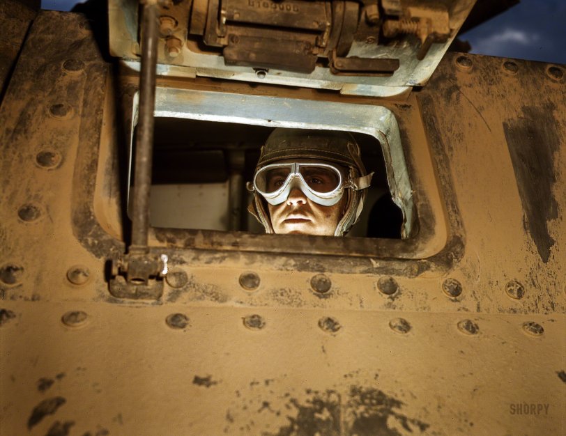 June 1942. "Tank driver -- Fort Knox, Kentucky." Kodachrome transparency by Alfred Palmer for the Office of War Information. View full size.