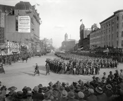 March 5, 1917. Washington, D.C. "Woodrow Wilson inaugural parade." Of peripheral interest on Pennsylvania Avenue: the three-act drama Just a Woman at Poli's Theater, and "modern 'Cadillac' automobiles" for rent at $3 an hour at the Willard Hotel. Harris & Ewing Collection glass negative. View full size.
