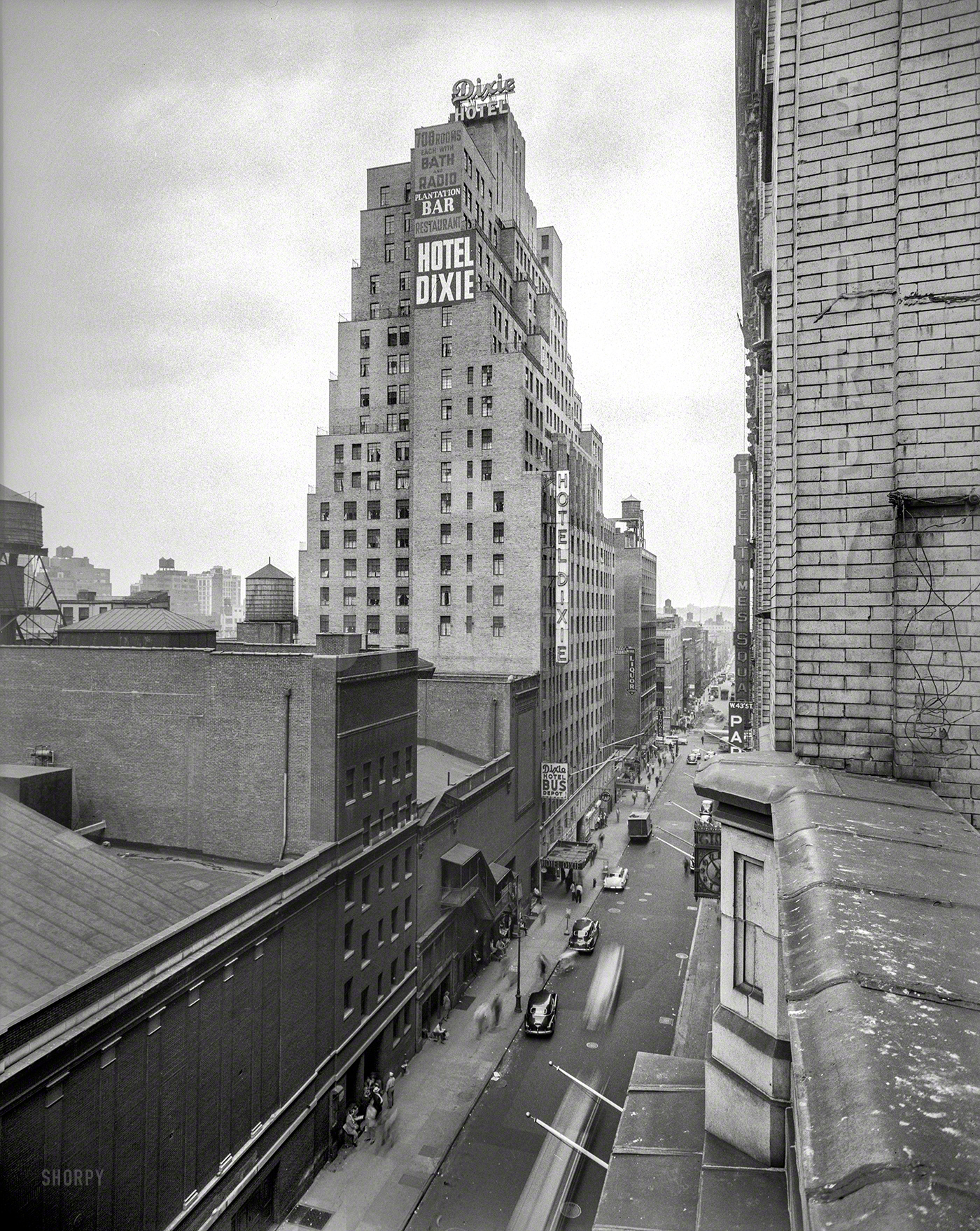 New York's 43rd Street, just off Times Square, circa 1950. "Hotel Dixie -- 700 rooms, each with bath and radio." Not to mention their own bus depot. Now the somewhat infamous Hotel Carter. 4x5 negative by James M. Fox. View full size.