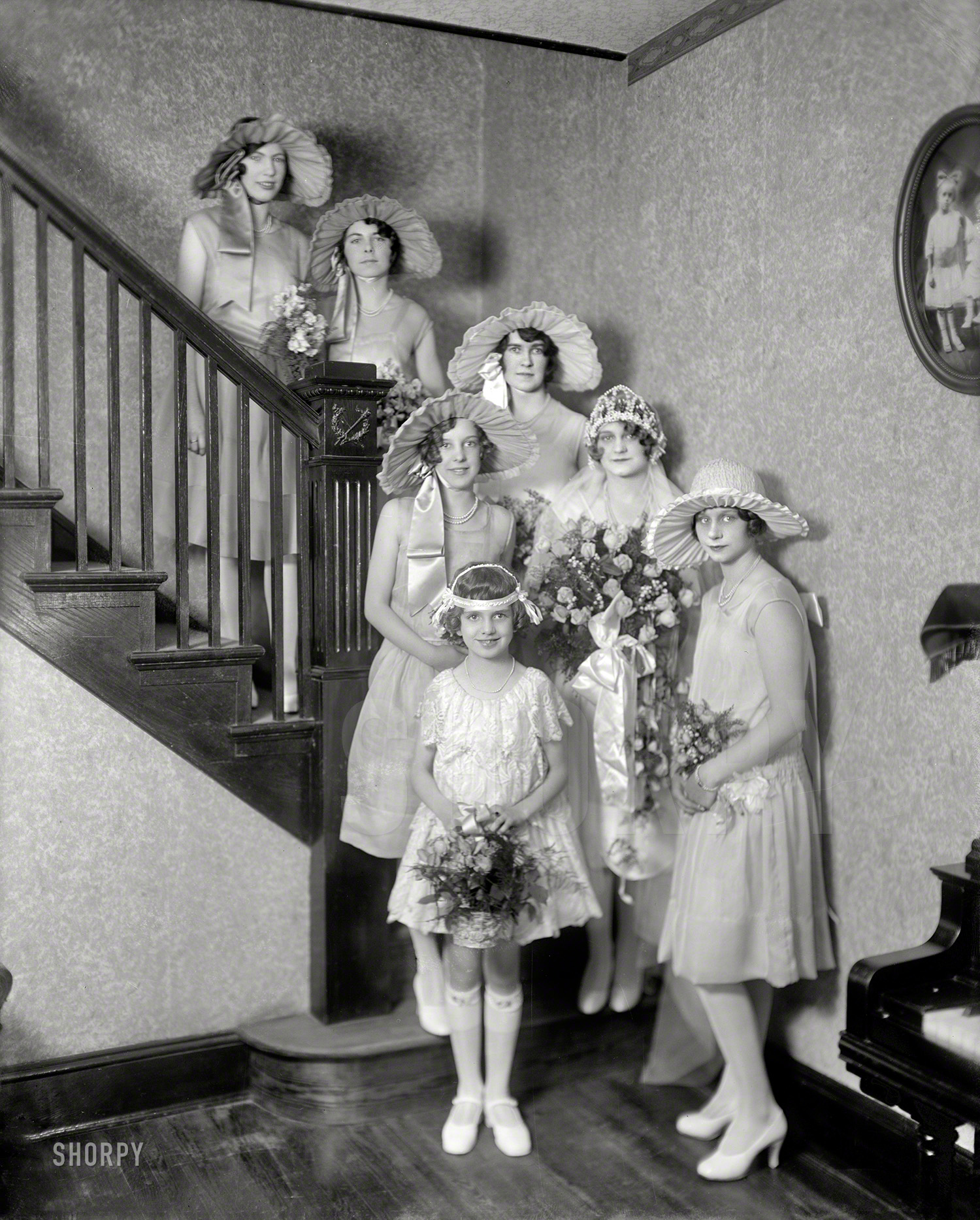 Washington, D.C., circa 1925. "Ashdown, Mrs. Raymond." June is just around the corner, down the stairs. Harris & Ewing glass negative. View full size.