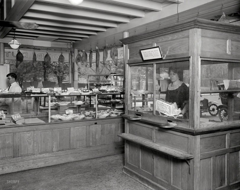 September 1921. Washington, D.C. "Old Dutch Market Bakery." We'll take one of everything, please. Harris &amp; Ewing Collection glass negative. View full size.
