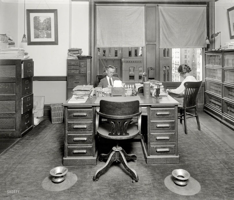 Washington, D.C., circa 1923. "Traffic World office." Tobacco-friendly on both the left and the right. Harris &amp; Ewing Collection glass negative. View full size.
