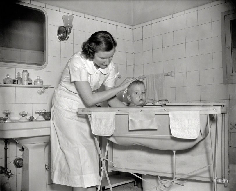 Washington, D.C., 1937. "Baby's bath" is all it says here. If you recognize yourself 78 years later, let us know. Harris &amp; Ewing glass negative. View full size.
