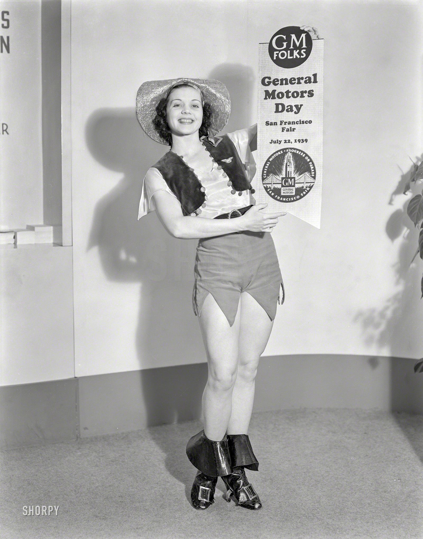 July 8, 1939. "Golden Gate International Exposition, San Francisco -- General Motors Day badge held by Miss Fisher Body." Whose parts all seem to fit unusually well. 8x10 negative originally from the Wyland Stanley collection. View full size.