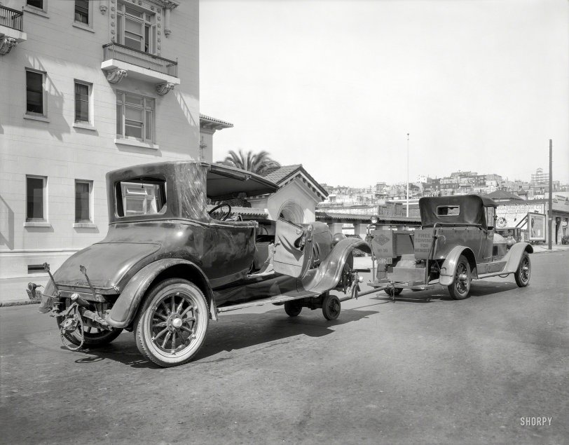 San Francisco, 1925. "California State Automobile Association. Wrecked Peerless being hauled at hospital on Broadway between Van Ness &amp; Polk." 8x10 film negative, originally from the Wyland Stanley collection. View full size.
