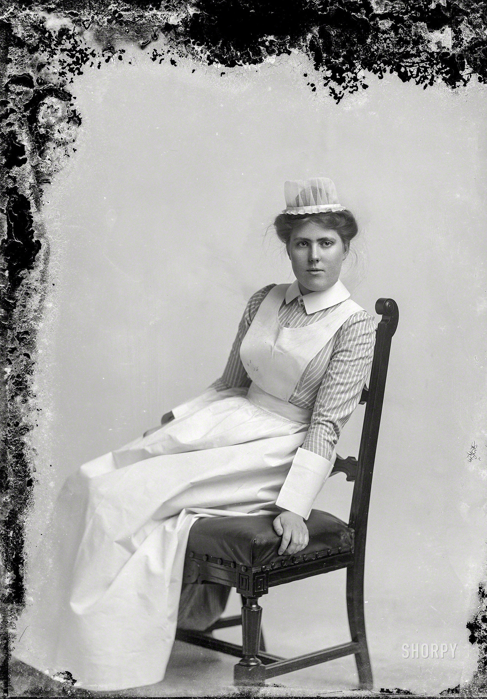 "Unknown woman in nurse's uniform -- between 1873 and ca. 1916." 5x7 inch glass negative from the C.M. Bell portrait studio in Washington, D.C. View full size.