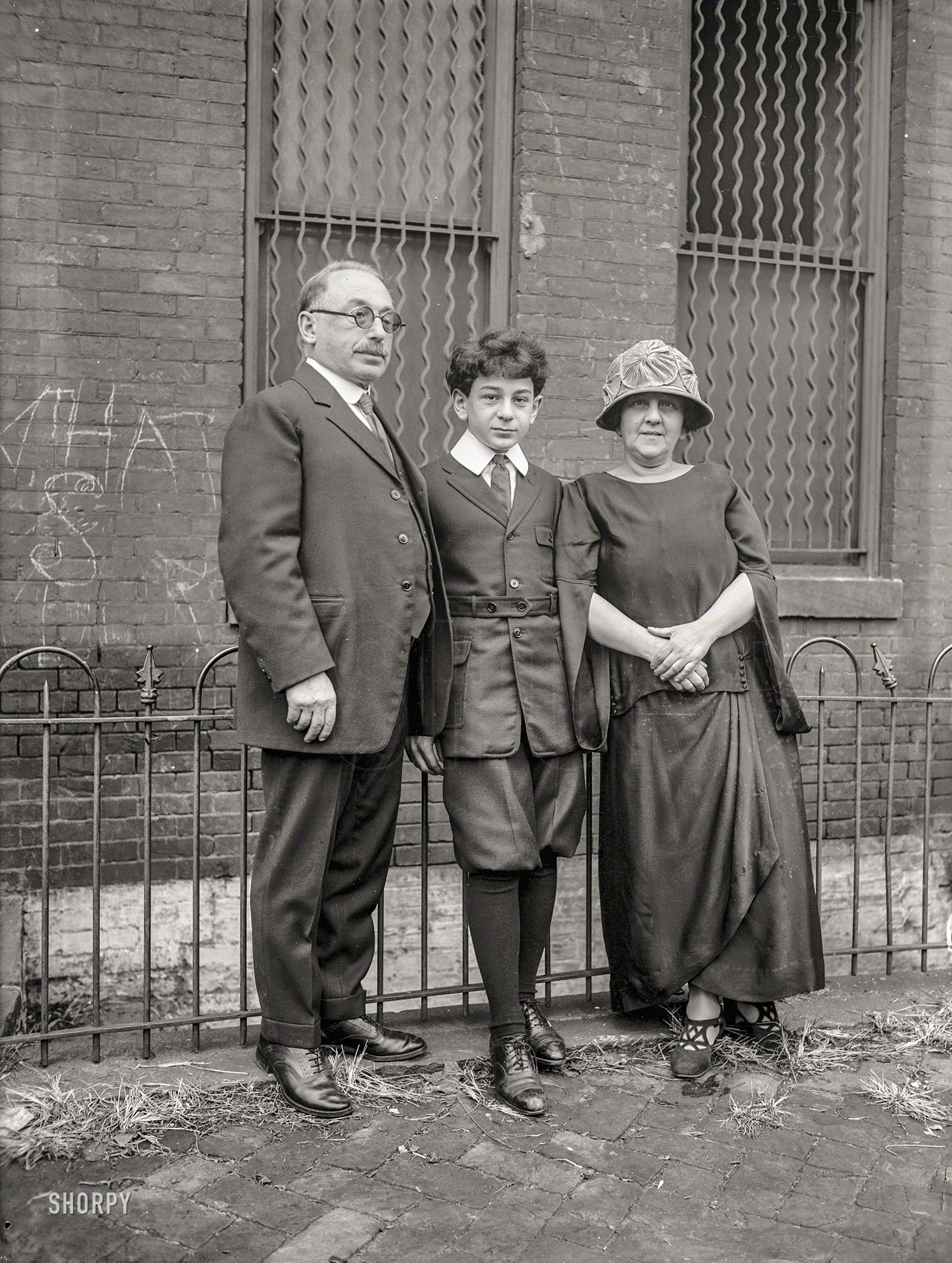 Nov. 16, 1923. Washington, D.C. "Shura Cherkassky, father Isaac & mother Lydia." The Russian-born piano prodigy at the age of 14.  National Photo Company Collection glass negative. View full size.