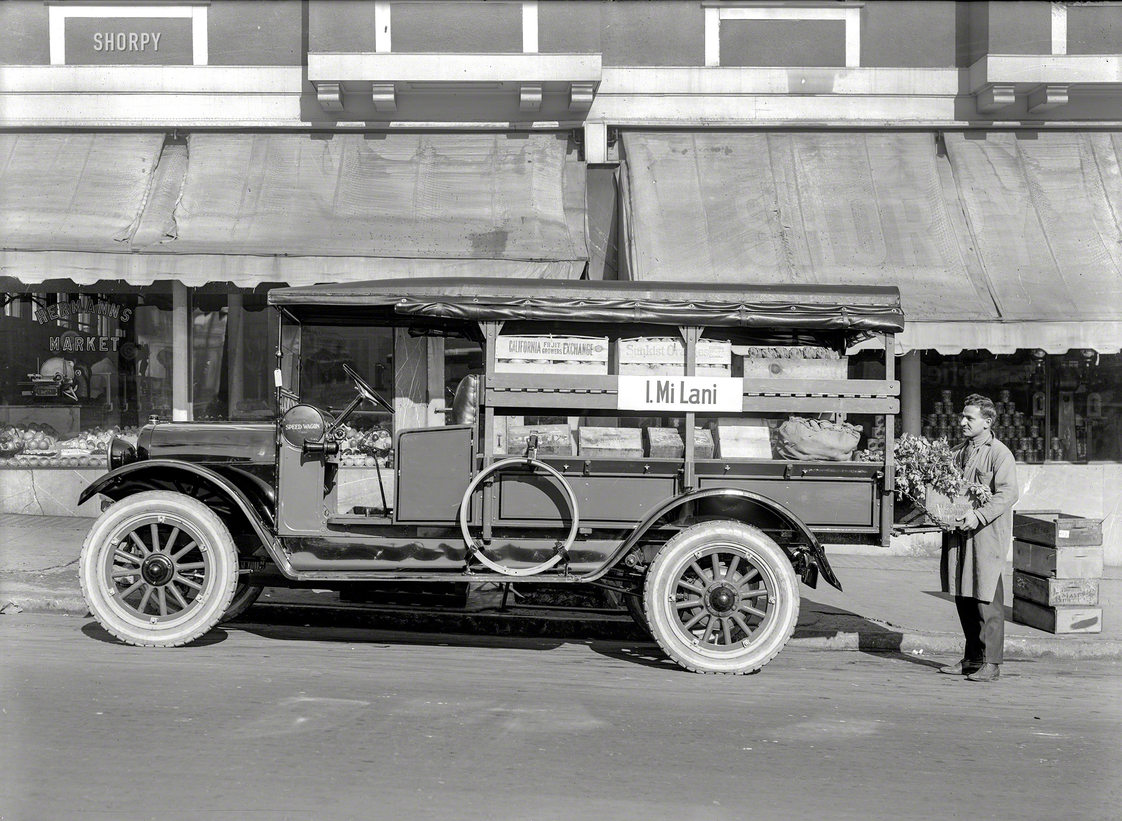 San Francisco ca. 1920. "I. Mi Lani -- REO Speed Wagon delivery truck." Also known as the Flying Artichoke. 5x7 glass plate by Chris Helin. View full size.