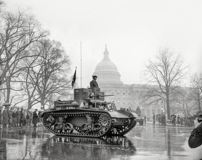April 6, 1939. "Memories of the World War were revived today as the latest types of tanks, preceded by 20,000 soldiers and veterans, paraded past the U.S. Capitol in the annual Army Day Parade which marked the 22nd anniversary of America into the World War. Thousands braved a heavy downpour to view the parade." Harris &amp; Ewing Collection glass negative. View full size.
