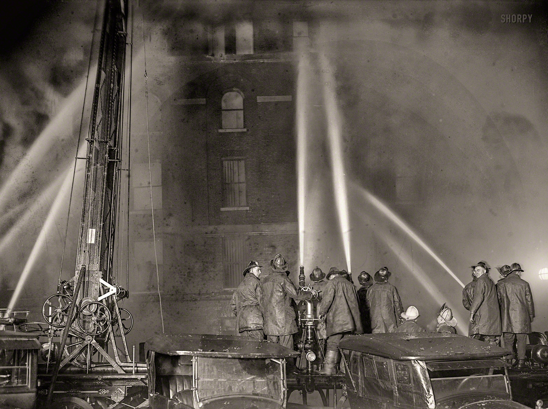 &nbsp; &nbsp; &nbsp; &nbsp; A spectacular fire that spread with a rapidity that stunned firemen virtually destroyed the five-story warehouse of S. Kann & Sons, at Eighth and D streets northwest, shortly after 7 o'clock last night. Merchandise valued at $175,000 was destroyed by the fire, which raced through the building as though fanned by a giant bellows.
&nbsp; &nbsp; &nbsp; &nbsp; It is believed that a cigarette was accidentally thrown into a basket of excelsior and that the basket was moved into the packing room from the street. -- Washington Post
January 10, 1925. Washington, D.C. "Fire at S. Kanns warehouse, Eighth and D streets N.W." National Photo Company Collection glass negative. View full size.