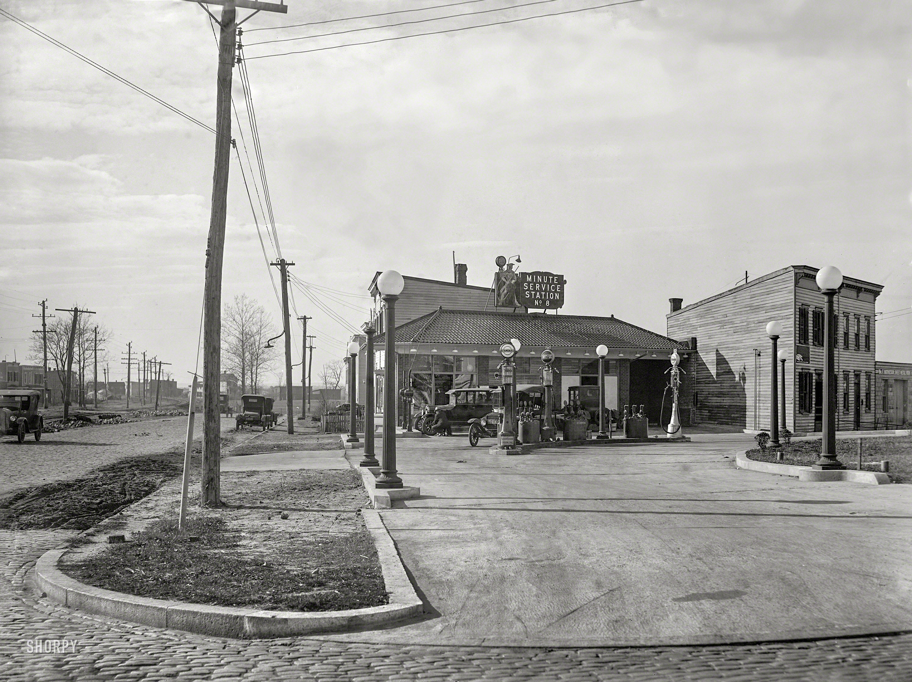 &nbsp; &nbsp; &nbsp; &nbsp; First posted here 10 years ago, and now updated with a better-quality image.
1925. Washington, D.C. "Texas Co., Minute Service Station No. 8, Twining City." Pennsylvania Avenue at Railroad Avenue S.E. near the Sousa Bridge. 8x10 inch glass negative, National Photo Company Collection. View full size.