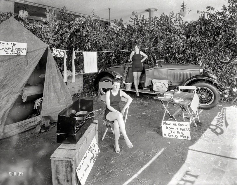 San Francisco circa 1925. "Swimsuit girls camping in dealer window with Willys-Knight auto." Say hello to Kay and Nina, who, in addition to camping and swimming, seem to enjoy golf. 8x10 film negative. View full size.
