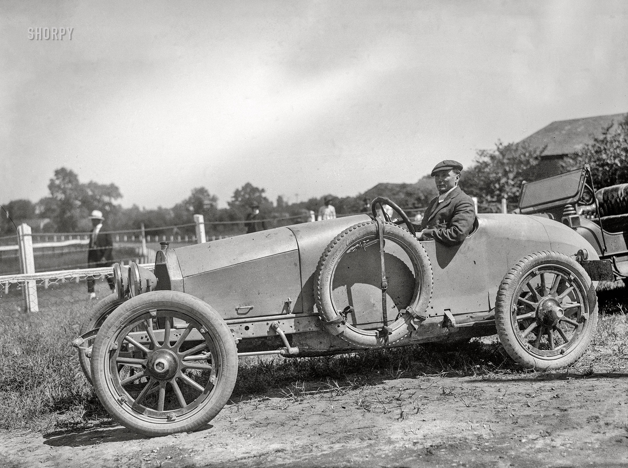 Washington, D.C. "Labor Day, 1916. Auto races at Benning track." Where one man's luck is riding on Acme Hemispheres. National Photo Company glass negative. View full size.