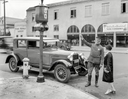San Francisco, 1927. "Traffic signals -- police officer stops pedestrian crossing against the light on Arguello Boulevard." Our second look at this shiny Hudson under the pretext of a traffic-safety lesson. 8x10 film negative. View full size.