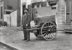 Washington, D.C., circa 1919. "Organ grinder." With a custom-fitted organ cover. National Photo Company Collection glass negative. View full size.