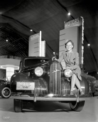 San Francisco, 1939. "General Motors exhibit, Golden Gate International Exposition. Girl sitting on LaSalle auto." The five-passenger touring sedan only $1581, "delivered here." 8x10 inch Agfa acetate negative. View full size.