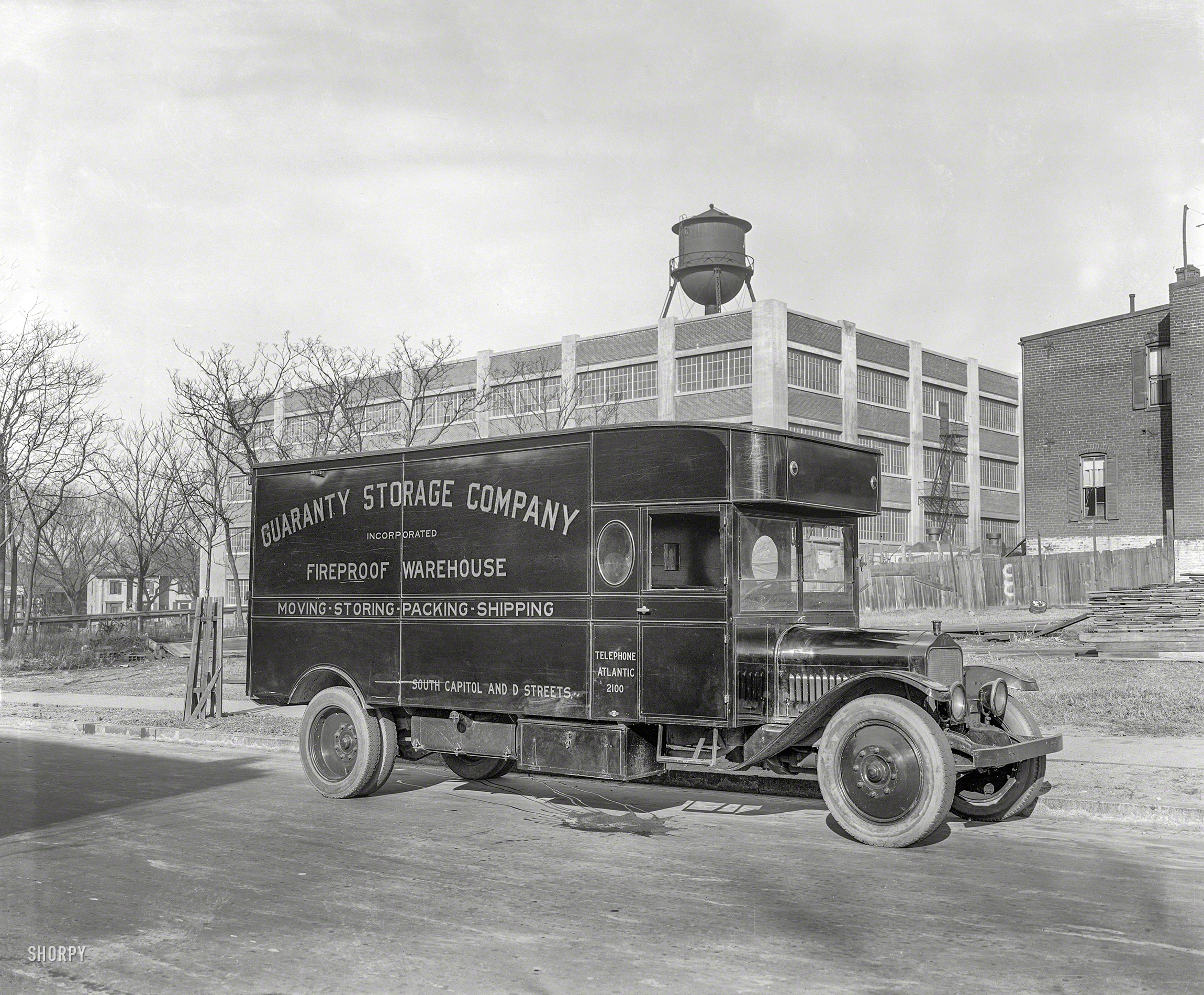 Washington, D.C., circa 1928. "Guaranty Storage Co. truck." Last glimpsed here, before having a little accident. National Photo glass negative. View full size.